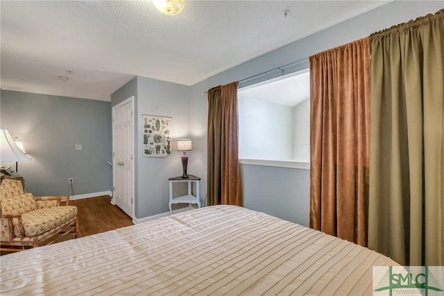 bedroom featuring hardwood / wood-style flooring