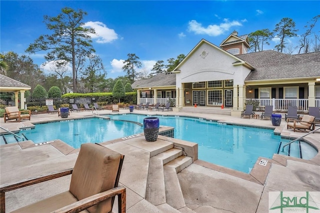 view of pool featuring a patio area