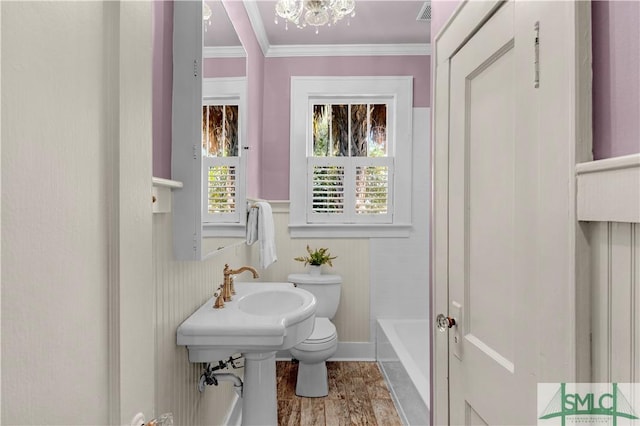 full bath featuring visible vents, toilet, crown molding, a bathtub, and walk in shower