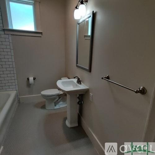 bathroom with separate shower and tub and toilet