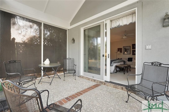 sunroom with lofted ceiling