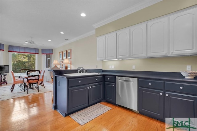 kitchen featuring white cabinetry, sink, stainless steel dishwasher, light hardwood / wood-style floors, and crown molding