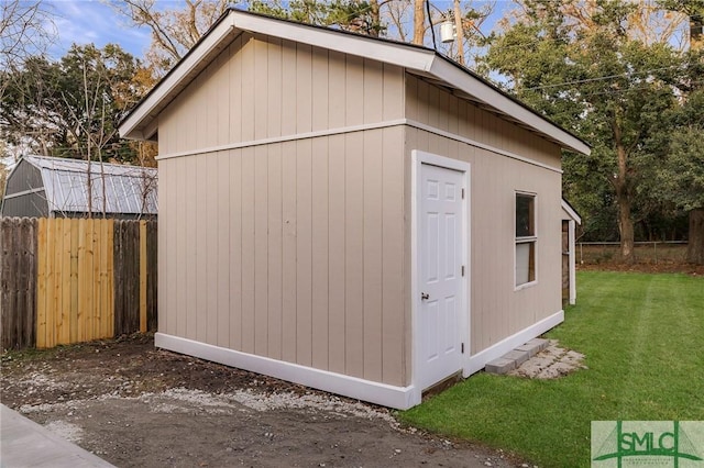 view of outdoor structure with a yard