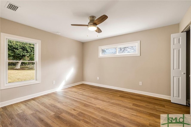 unfurnished room featuring ceiling fan and light hardwood / wood-style floors