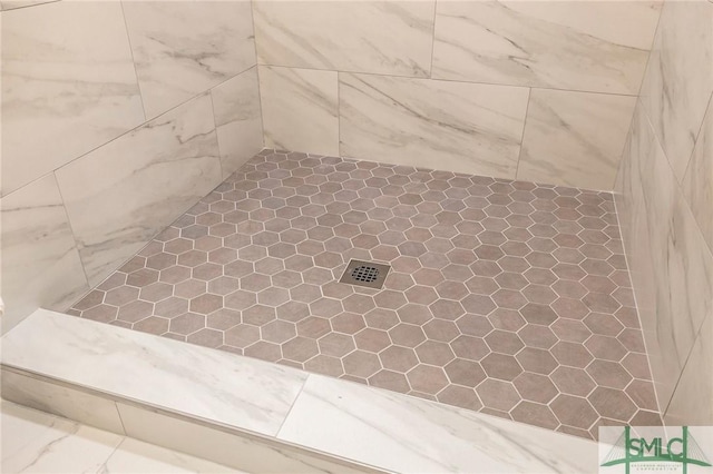 room details with a tile shower