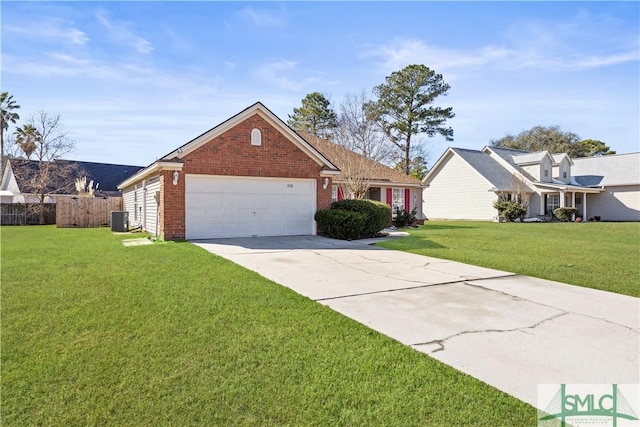 view of front of house with a garage, a front yard, and central air condition unit