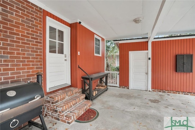 entrance to property featuring a garage