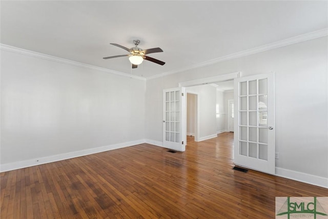 spare room featuring hardwood / wood-style flooring, ornamental molding, ceiling fan, and french doors