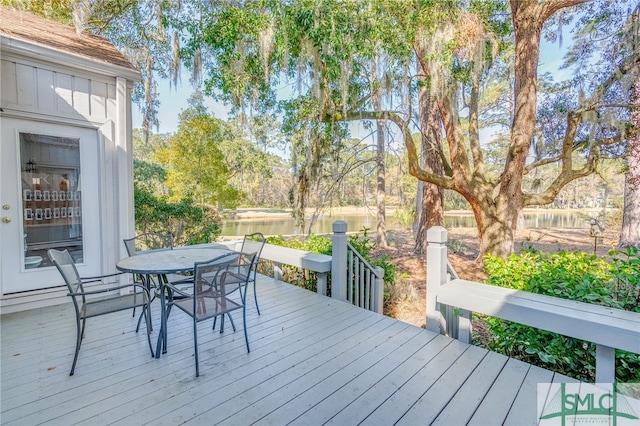 deck featuring a water view