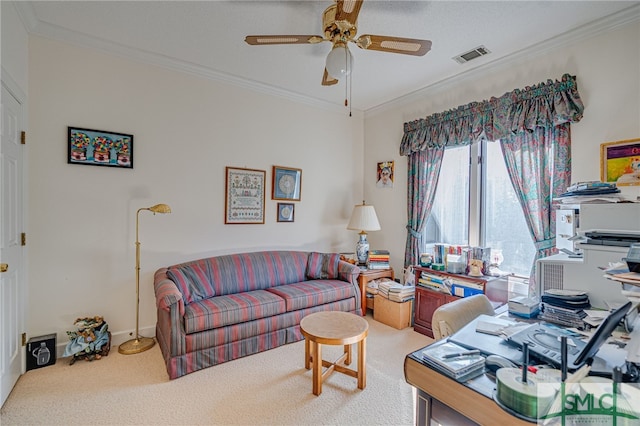 living room featuring ornamental molding, ceiling fan, and carpet flooring