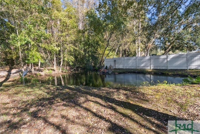 view of yard with a water view