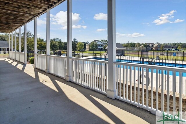 exterior space featuring a fenced in pool