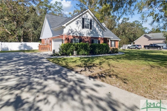 view of front of property with a front lawn