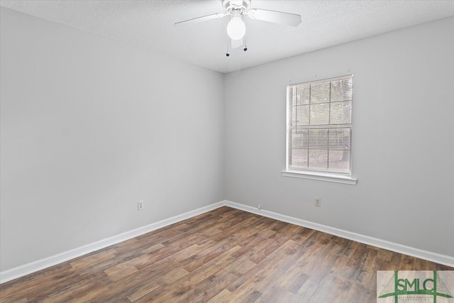 empty room with hardwood / wood-style floors, a textured ceiling, and ceiling fan