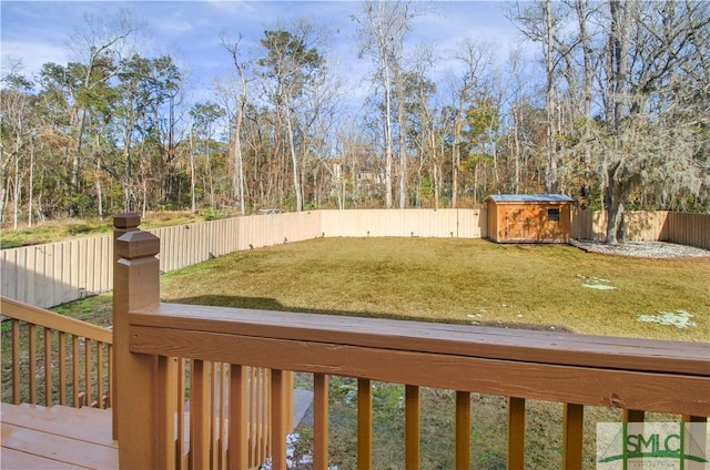 view of yard featuring a shed and a deck