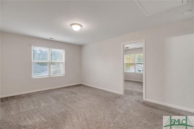 unfurnished room with carpet flooring