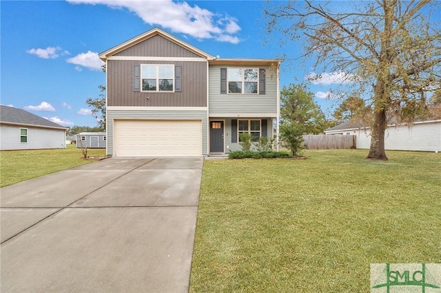 view of front facade with a garage and a front yard