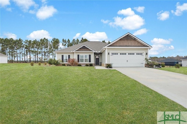 view of front of home with a garage and a front lawn