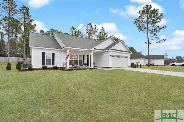 view of front of property with a garage, a front lawn, and a porch