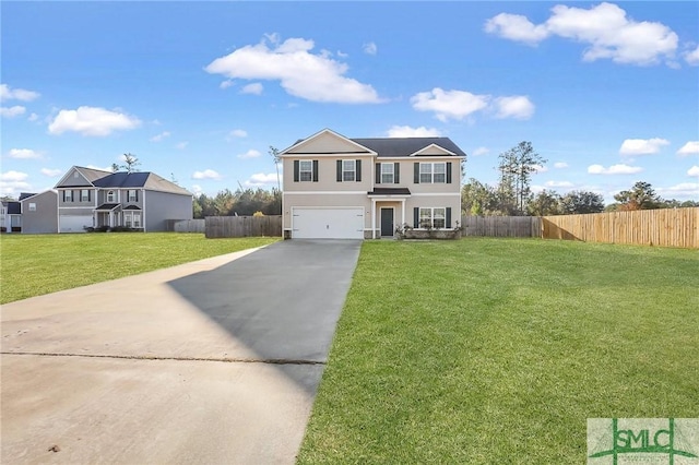 view of front of house featuring a garage and a front lawn