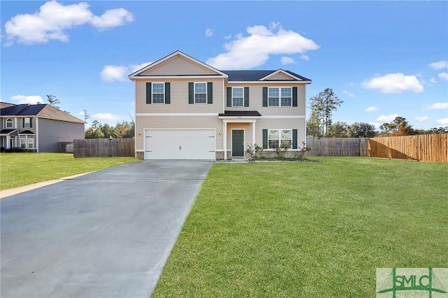 front of property featuring a garage and a front lawn