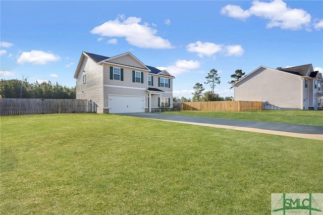 view of front of home featuring a garage and a front lawn