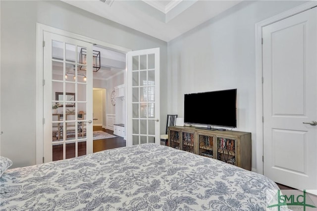 bedroom featuring french doors and ornamental molding