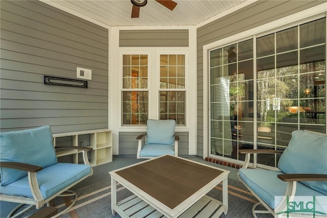 exterior space with ceiling fan