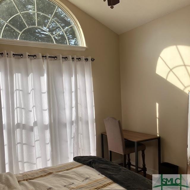 bedroom with vaulted ceiling