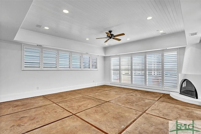 unfurnished living room featuring recessed lighting, visible vents, baseboards, and a ceiling fan