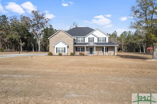 view of front property featuring a front lawn