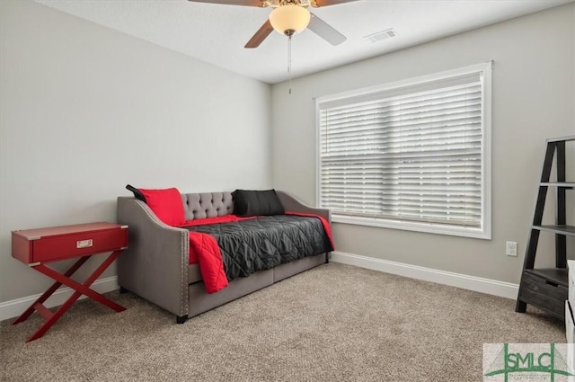 carpeted bedroom with ceiling fan