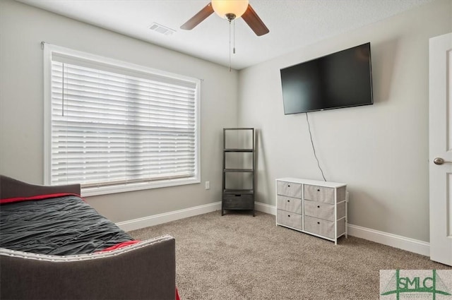 carpeted bedroom with ceiling fan