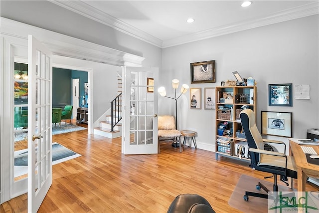 office area featuring french doors, ornamental molding, and wood-type flooring