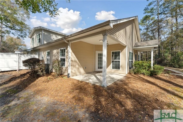 rear view of house featuring a patio area