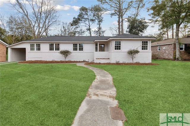 ranch-style house with a carport and a front yard