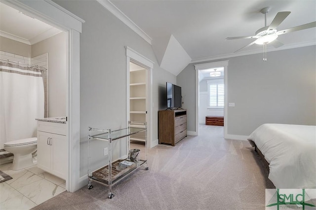 carpeted bedroom with crown molding and ceiling fan