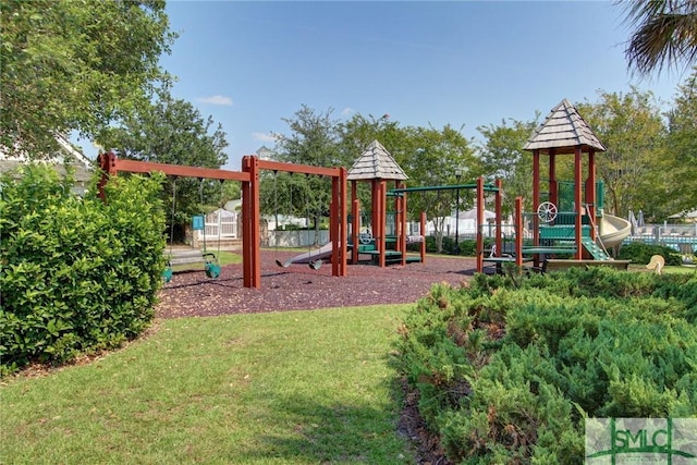 view of playground with a yard