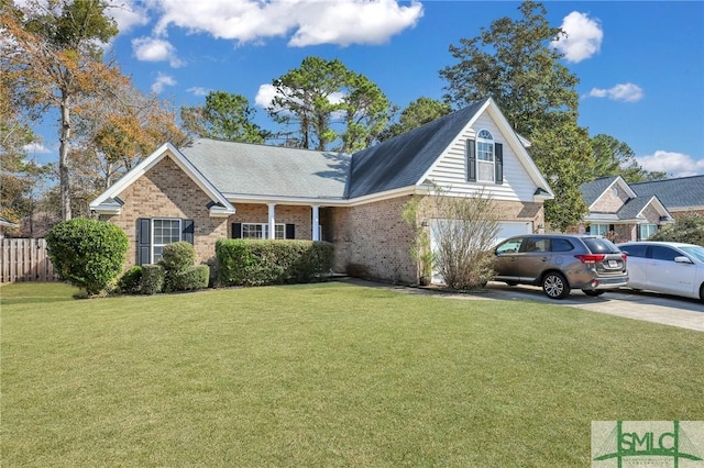 view of front facade featuring a garage and a front yard