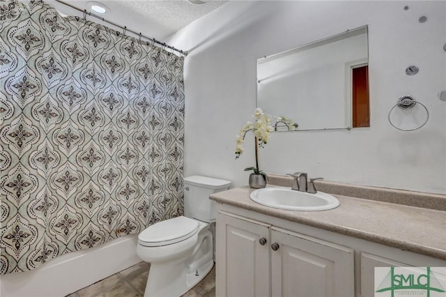 full bathroom featuring vanity, shower / bath combo, a textured ceiling, and toilet