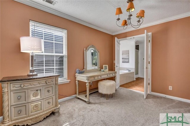 carpeted home office featuring ornamental molding, a textured ceiling, and a notable chandelier