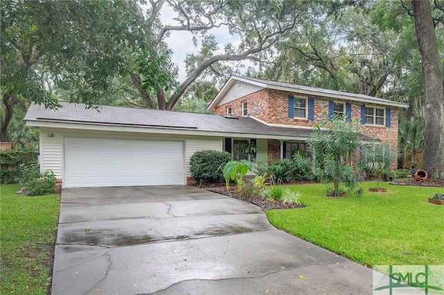 view of front of property with a garage and a front yard