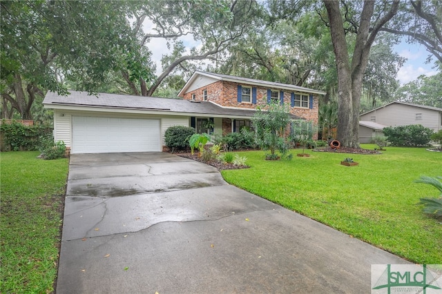 view of front of property with a garage and a front yard