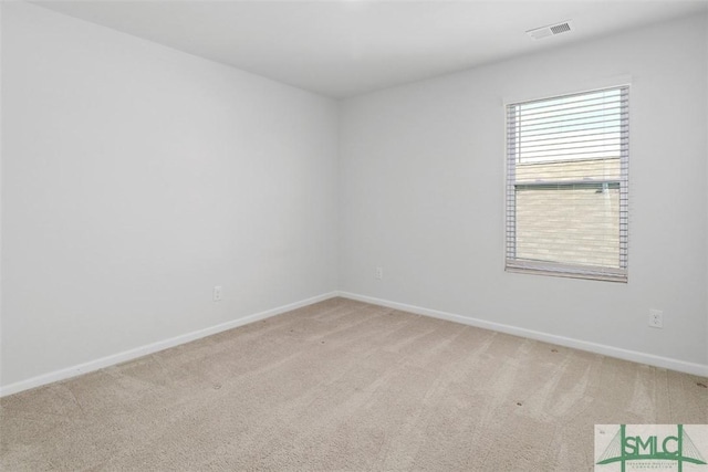 empty room with light carpet