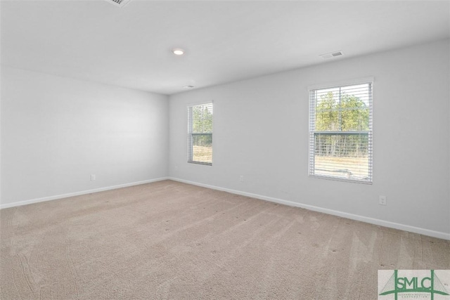 view of carpeted spare room