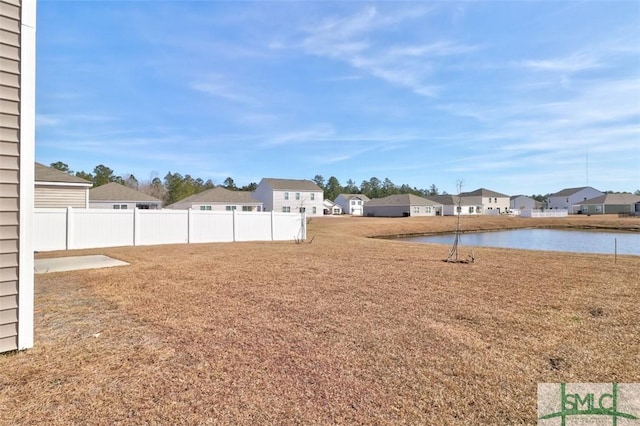 view of yard with a water view