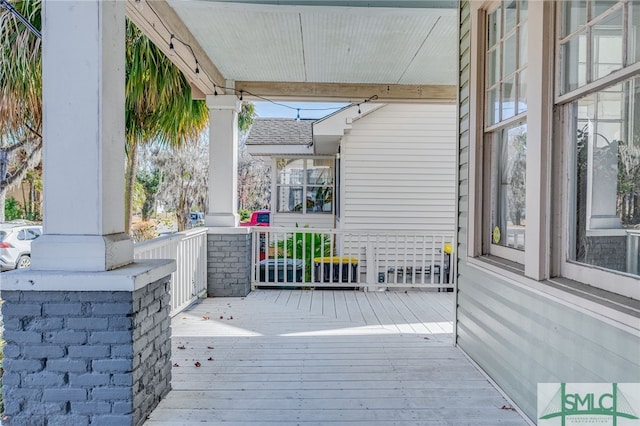 wooden deck featuring a porch