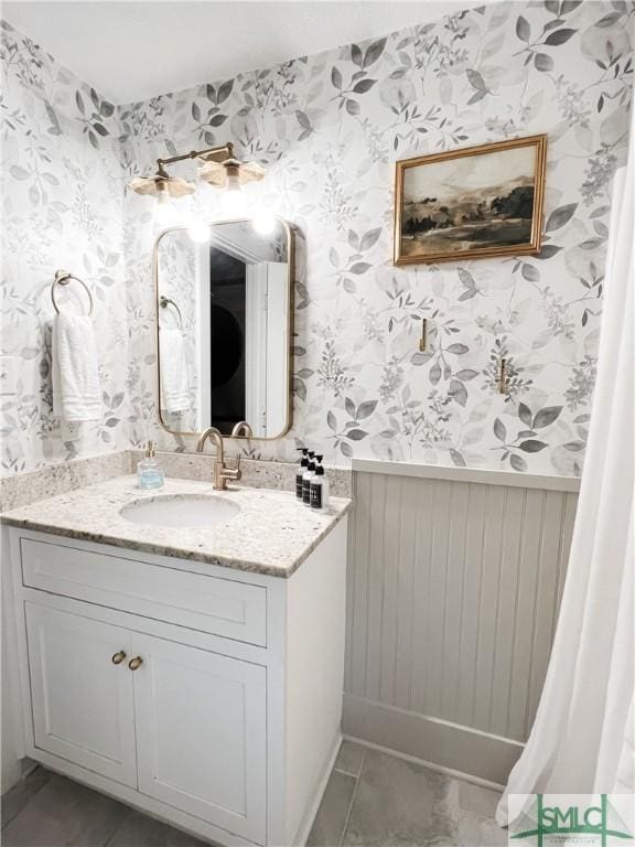 bathroom with vanity and tile patterned floors