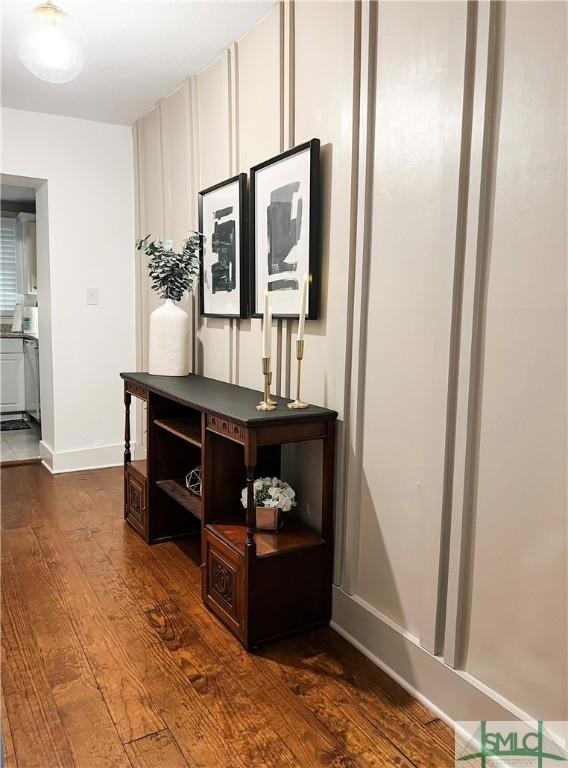 hallway featuring dark hardwood / wood-style floors