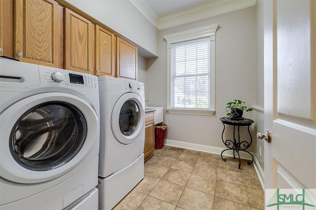 washroom with cabinets, ornamental molding, light tile patterned flooring, and independent washer and dryer